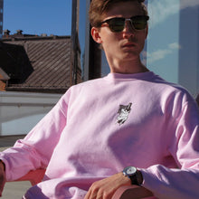 Load image into Gallery viewer, Luke Insoll wearing a sweatshirt in Umeå