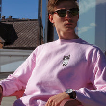 Load image into Gallery viewer, Luke Insoll wearing a sweatshirt in Umeå