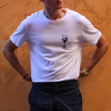 Load image into Gallery viewer, Male model in Stockholm wearing a white tee