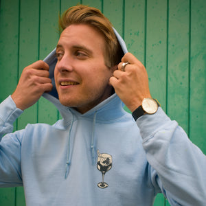 Man wearing a stylish blue hoodie